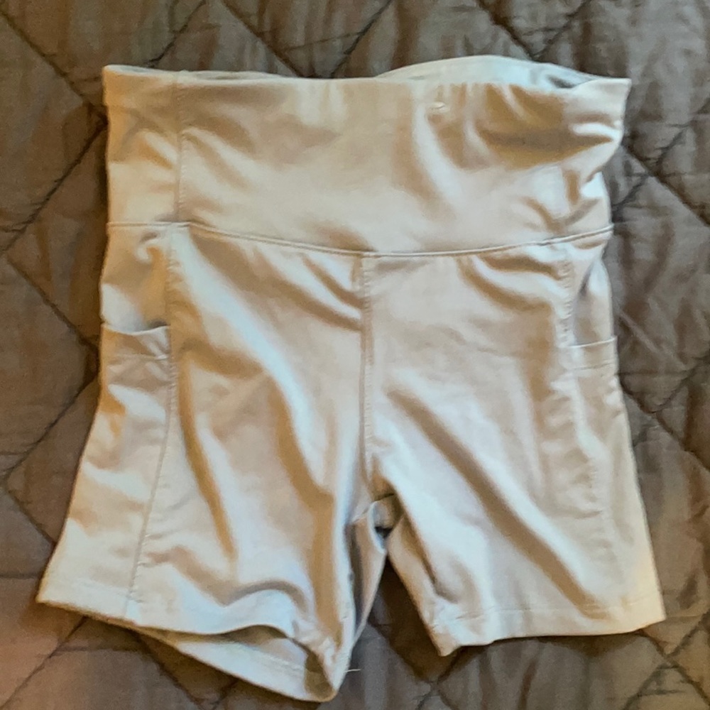 Light blue biker shorts with pockets